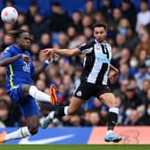  Jacob Murphy of Newcastle United is challenged by Trevoh Chalobah of Chelsea during the Premier League match between Chelsea and Newcastle United at Stamford Bridge.