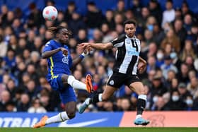 Jacob Murphy of Newcastle United is challenged by Trevoh Chalobah of Chelsea during the Premier League match between Chelsea and Newcastle United at Stamford Bridge.