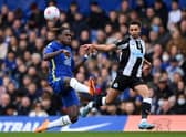  Jacob Murphy of Newcastle United is challenged by Trevoh Chalobah of Chelsea during the Premier League match between Chelsea and Newcastle United at Stamford Bridge.