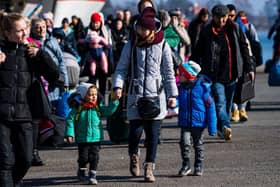 Passengers and Ukrainian refugees arrive with a ferry from Gdansk in Poland to the port of Nynashamn, about 60 km south of Stockholm, Sweden, on March 15, 2022. - More than three million people have now fled Ukraine since Russia invaded on February 24, the United Nations said on March 15, 2022. 