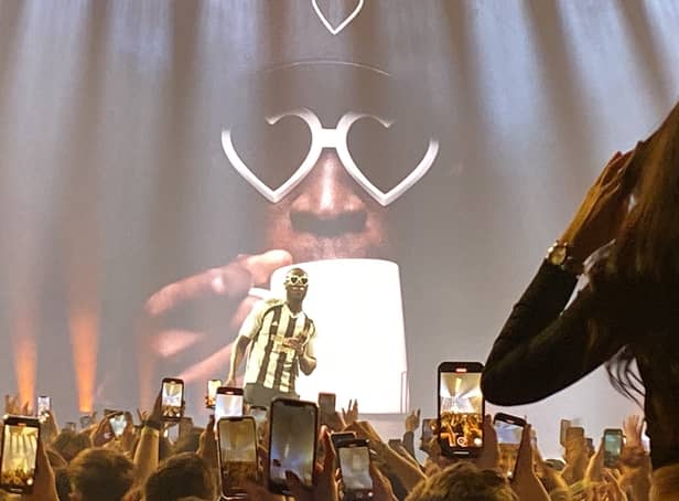 <p>Stormzy poses in a Newcastle shirt (Image: Twitter @MichaelArma1997)</p>