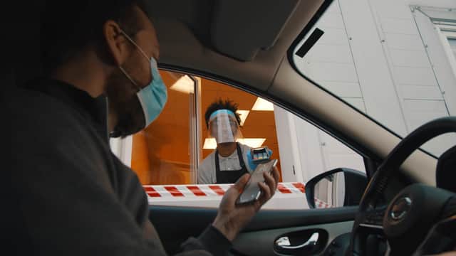 The law changes the rules around using a phone at a drive-through
