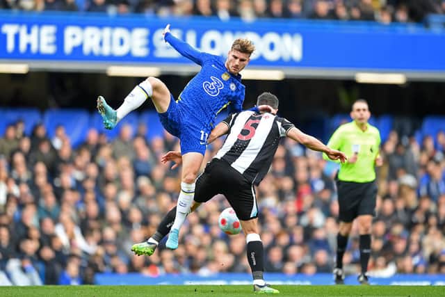 Fabian Schar of Newcastle United is challenged by Timo Werner of Chelsea during the Premier League match between Chelsea and Newcastle United at Stamford Bridge on March 13, 2022 in London, England. (Photo by Clive Mason/Getty Images)