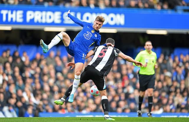 Fabian Schar of Newcastle United is challenged by Timo Werner of Chelsea during the Premier League match between Chelsea and Newcastle United at Stamford Bridge on March 13, 2022 in London, England. (Photo by Clive Mason/Getty Images)