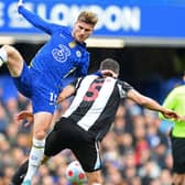 Fabian Schar of Newcastle United is challenged by Timo Werner of Chelsea during the Premier League match between Chelsea and Newcastle United at Stamford Bridge on March 13, 2022 in London, England.