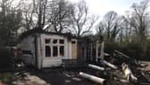 A 100-year-old bowling clubhouse was severely damaged and two suspects have been identified after a community appeal