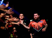 Michael ‘Bully Boy’ Smith of England walks out before he competes against Michael ‘Mighty Mike’ van Gerwen of Netherlands. Photo: Dean Mouhtaropoulos/Getty Images