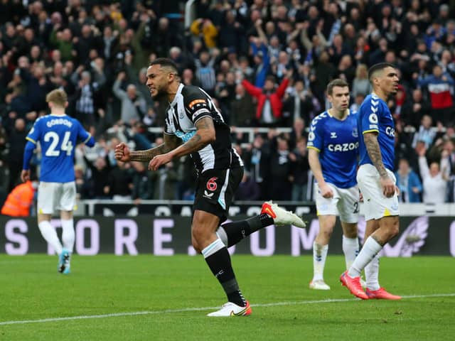 Newcastle United captain Jamaal Lascelles celebrates his equaliser against Everton.