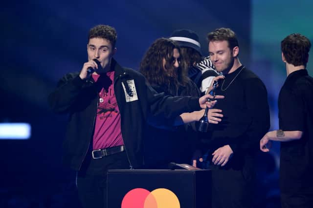 Fender collects his Brit at the 2022 awards (Image: Getty Images)