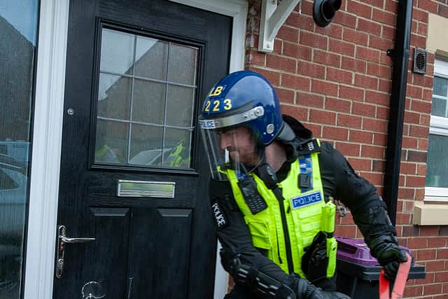 Police carried out a series of warranted raids on suspected drug dealers, arresting nine