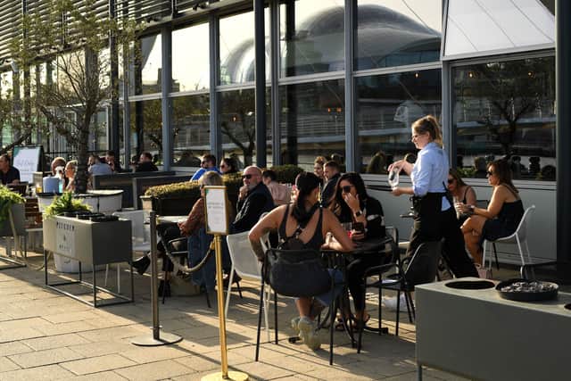 Customers enjoy a drink at Pitcher & Piano (Image: Getty Images)