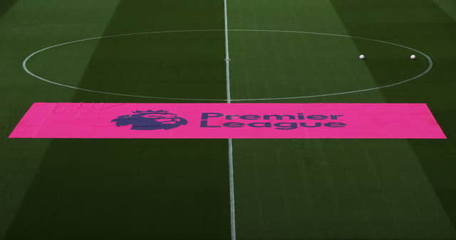 <p>A general view of a Premier League banner on the pitch prior to the Premier League match between Norwich City and Newcastle United at Carrow Road on April 23, 2022 in Norwich, England.</p>