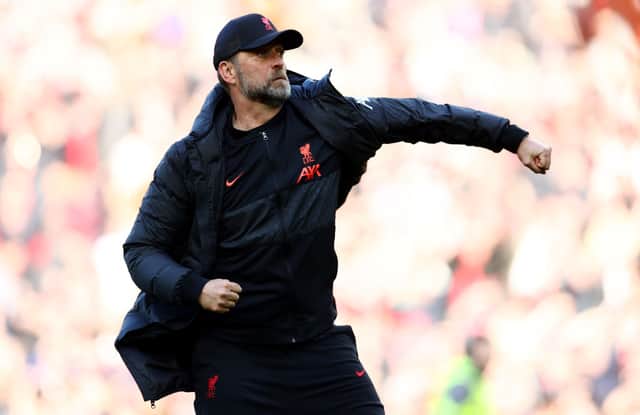 Jurgen Klopp, Manager of Liverpool celebrates with the fans after their sides victory during the Premier League match between Liverpool and Everton at Anfield on April 24, 2022 in Liverpool, England. (Photo by Clive Brunskill/Getty Images)