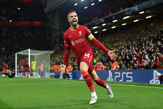 Jordan Henderson of Liverpool celebrates after their team’s first goal which came through a Geronimo Rulli of Villarreal CF (not pictured) own goal during the UEFA Champions League Semi Final Leg One match between Liverpool and Villarreal at Anfield on April 27, 2022 in Liverpool, England. 