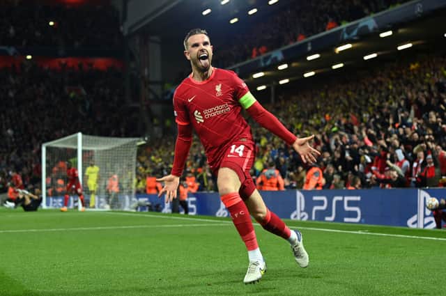 Jordan Henderson of Liverpool celebrates after their team’s first goal which came through a Geronimo Rulli of Villarreal CF (not pictured) own goal during the UEFA Champions League Semi Final Leg One match between Liverpool and Villarreal at Anfield on April 27, 2022 in Liverpool, England.
