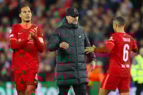 Jurgen Klopp, Manager of Liverpool embraces with Thiago Alcantara of Liverpool during the UEFA Champions League Semi Final Leg One match between Liverpool and Villarreal at Anfield on April 27, 2022 in Liverpool, England.