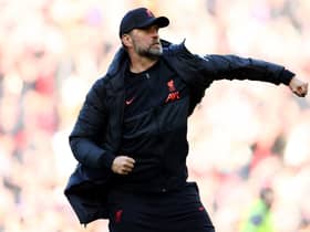 Jurgen Klopp, Manager of Liverpool celebrates with the fans after their sides victory during the Premier League match between Liverpool and Everton at Anfield on April 24, 2022 in Liverpool, England.