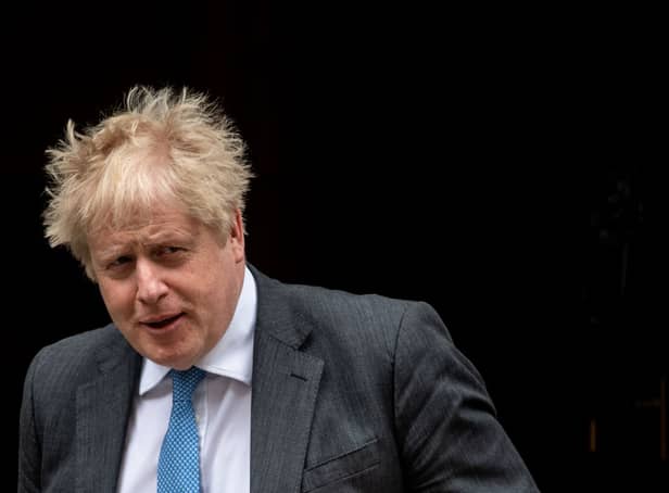 <p>British Prime Minister, Boris Johnson, leaves Downing Street to attend Prime Ministers Questions at the House of Parliament on April 27, 2022 in London, England. (Photo by Chris J Ratcliffe/Getty Images)</p>