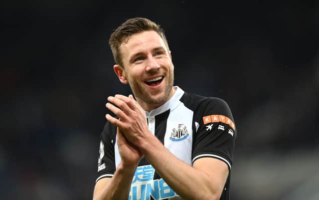 Newcastle United left-back Paul Dummett has signed a new contract on Tyneside.