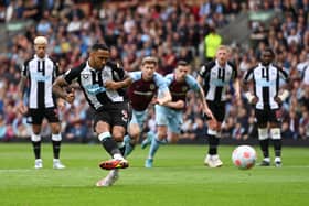 Callum Wilson of Newcastle United scores their side’s first goal from the penalty spot during the Premier League match between Burnley and Newcastle United at Turf Moor on May 22, 2022 in Burnley, England.