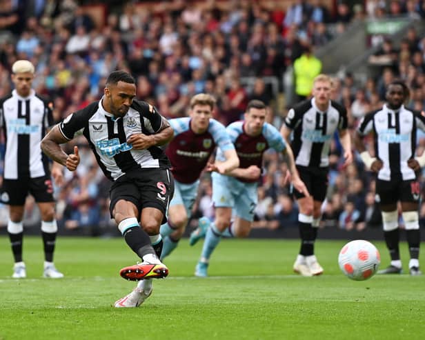 Callum Wilson of Newcastle United scores their side’s first goal from the penalty spot during the Premier League match between Burnley and Newcastle United at Turf Moor on May 22, 2022 in Burnley, England.