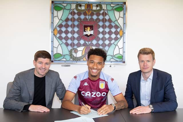 New Aston Villa signing Boubacar Kamara alongside manager Steven Gerrard and Sporting Director Johan Lange.