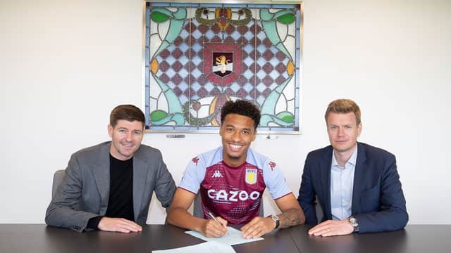 New Aston Villa signing Boubacar Kamara alongside manager Steven Gerrard and Sporting Director Johan Lange.