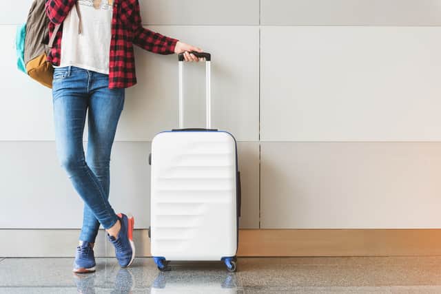 Remind yourself of hand luggage rules (Image: Adobe Stock)