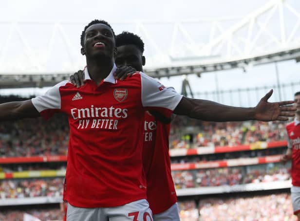 <p>Eddie Nketiah of Arsenal celebrates after scoring the 2nd goal during the Premier League match between Arsenal and Everton at Emirates Stadium on May 22, 2022 in London, England.</p>