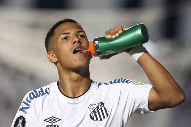 Brazil’s Santos Angelo Gabriel has some water during the Copa Libertadores football tournament group stage match against Argentina’s Boca Juniors at Vila Belmiro stadium in Santos, Brazil, on May 11, 2021.