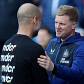 Pep Guardiola, Manager of Manchester City, shakes hands with Eddie Howe, Manager of Newcastle United, prior to kick off of the Premier League match between Manchester City and Newcastle United at Etihad Stadium on May 08, 2022.