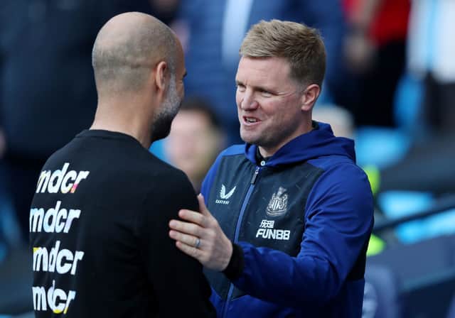Pep Guardiola, Manager of Manchester City, shakes hands with Eddie Howe, Manager of Newcastle United, prior to kick off of the Premier League match between Manchester City and Newcastle United at Etihad Stadium on May 08, 2022.
