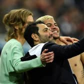 Newcastle United’s English minority owner Amanda Staveley (L) and her husband Mehrdad Ghodoussi pose for a selfie with Newcastle United’s Brazilian midfielder Bruno Guimaraes after the English Premier League football match between Newcastle United and Arsenal at St James’ Park in Newcastle-upon-Tyne, north east England on May 16, 2022.