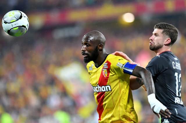 Lens’ Ivorian midfielder Seko Fofana (L) and Monaco’s Brazilian defender Caio Henrique Oliveira Silva fight for the ball  during the French L1 football match between RC Lens and AS Monaco at Stade Bollaert-Delelis in Lens, northern France on May 21, 2022. 