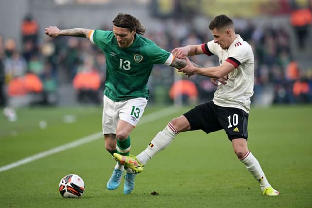 Jeff Hendrick of Republic Of Ireland is challenged by Thorgan Hazard of Belgium during the International Friendly match between Republic of Ireland and Belgium at Aviva Stadium on March 26, 2022 in Dublin, Ireland.