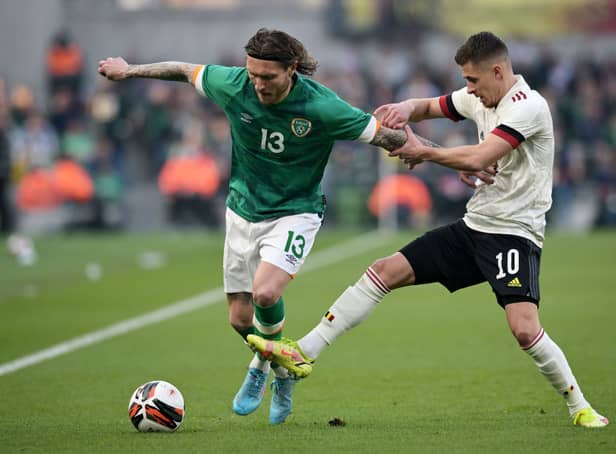 Jeff Hendrick of Republic Of Ireland is challenged by Thorgan Hazard of Belgium during the International Friendly match between Republic of Ireland and Belgium at Aviva Stadium on March 26, 2022 in Dublin, Ireland.