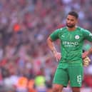 Zak Steffen of Manchester City reacts following defeat in The Emirates FA Cup Semi-Final match between Manchester City and Liverpool at Wembley Stadium on April 16, 2022 in London, England. 