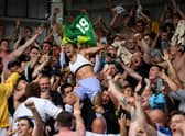 Raphinha of Leeds United celebrates with the fans after avoiding relegation following victory  in the Premier League match between Brentford and Leeds United at Brentford Community Stadium on May 22, 2022 in Brentford, England.