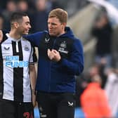 Newcastle United head coach Eddie Howe speaks with Miguel Almiron. (Photo by Stu Forster/Getty Images)