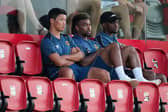 Hwang Hee-Chan, Adama Traore and Nelson Semedo of Wolverhampton Wanderers look on during a pre-season friendly match between Deportivo Alaves and Wolverhampton Wanderers at Estadio Camilo Cano on July 20, 2022 in Benidorm, Spain. 