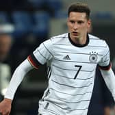 Julian Draxler looks on during the international friendly match between Germany and Israel in March (Photo by Alexander Hassenstein/Getty Images)