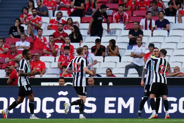 Miguel Almiron of Newcastle United FC celebrates with teammates after scoring a goal during the Eusebio Cup match between SL Benfica and Newcastle United at Estadio da Luz on July 26, 2022 in Lisbon, Portugal.  (Photo by Gualter Fatia/Getty Images)