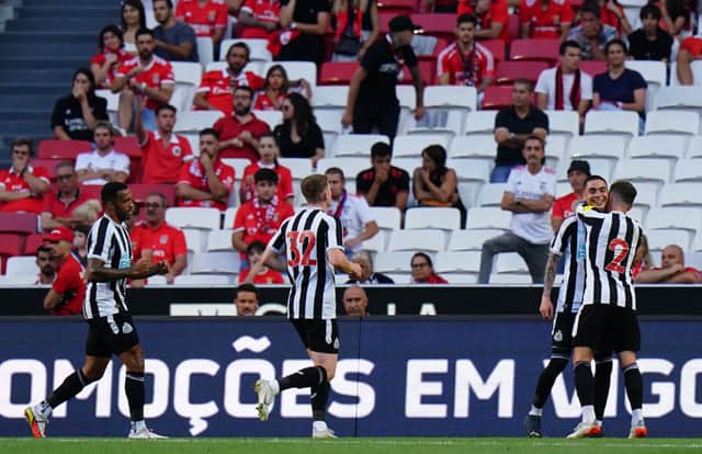Miguel Almiron of Newcastle United FC celebrates with teammates after scoring a goal during the Eusebio Cup match between SL Benfica and Newcastle United at Estadio da Luz on July 26, 2022 in Lisbon, Portugal. (Photo by Gualter Fatia/Getty Images)