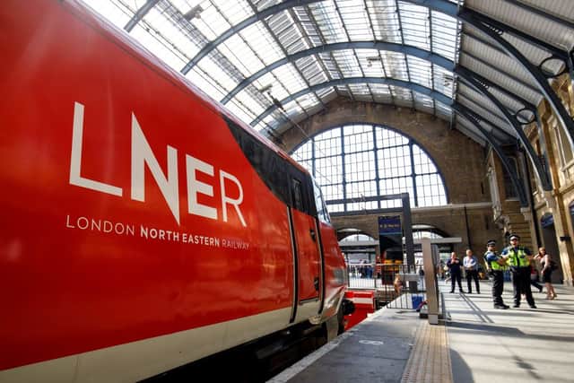 A London North Eastern Railway (LNER) train is pictured at King’s Cross rail station in London  (Photo by TOLGA AKMEN/AFP via Getty Images)