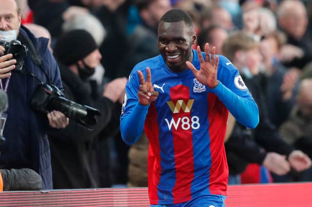  Belgian striker Christian Benteke celebrates after scoring their first goal during the English Premier League  (Photo by FRANK AUGSTEIN/POOL/AFP via Getty Images)