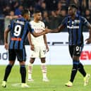 Duvan Zapata of Atalanta is congratulated by teammate Luis Muriel after scoring their side’s first goal against AC Milan in October 2021 (Photo by Marco Luzzani/Getty Images)