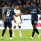 Duvan Zapata of Atalanta is congratulated by teammate Luis Muriel after scoring their side’s first goal against AC Milan in October 2021 (Photo by Marco Luzzani/Getty Images)