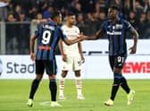 Duvan Zapata of Atalanta is congratulated by teammate Luis Muriel after scoring their side’s first goal against AC Milan in October 2021 (Photo by Marco Luzzani/Getty Images)