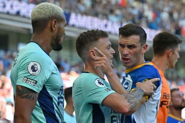 Brighton’s Dutch defender Joel Veltman (R) clashes with Newcastle United’s Brazilian striker Joelinton (L) during the English Premier League football match between Brighton and Hove Albion and Newcastle United at the American Express Community Stadium in Brighton, southern England on August 13, 2022.