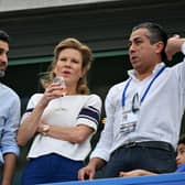 Newcastle United’s English minority owner Amanda Staveley and her husband Mehrdad Ghodoussi chat with Chelsea’s owner US businessman Behdad Eghbali (Photo by GLYN KIRK/AFP via Getty Images)